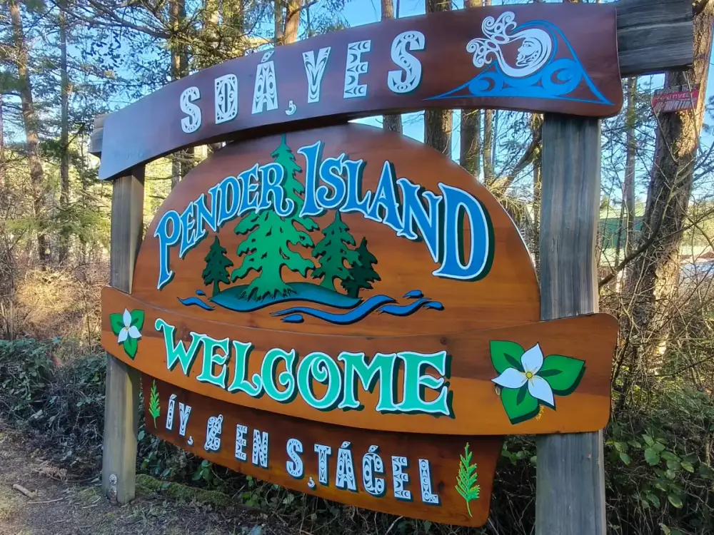 The colourful Pender Island welcome sign